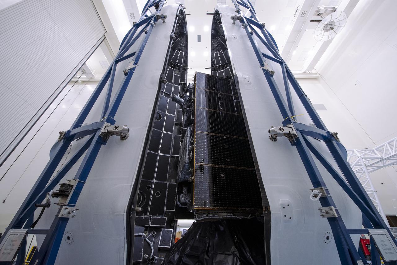 Technicians encapsulate NASA’s Europa Clipper spacecraft inside SpaceX’s Falcon Heavy payload fairing in the Payload Hazardous Servicing Facility at NASA’s Kennedy Space Center in Florida on Wednesday, Oct. 2, 2024. The payload fairing will protect the spacecraft during liftoff from Launch Complex 39A on its journey to explore Jupiter’s icy moon, Europa. The spacecraft will complete nearly 50 flybys of Jupiter’s icy moon, Europa, to determine if there are conditions suitable for life beyond Earth.
