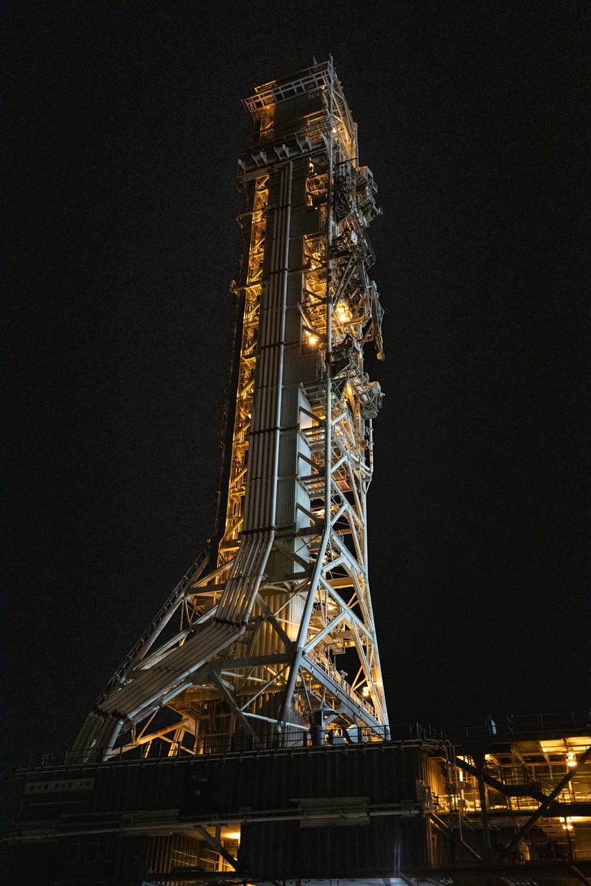 NASA’s mobile launcher 1 atop the spaceport’s crawler is transported inside the agency’s Vehicle Assembly Building at Kennedy Space Center in Florida ahead of integration of the Artemis II Moon rocket on Friday, Oct. 4, 2024. The mobile launcher has been at Launch Complex 39B since August 2023 undergoing upgrades and tests in preparation for NASA’s Artemis II mission. The mobile launcher will be used to assemble, process, and launch NASA’s SLS (Space Launch Systems) and Orion spacecraft to the Moon and beyond.