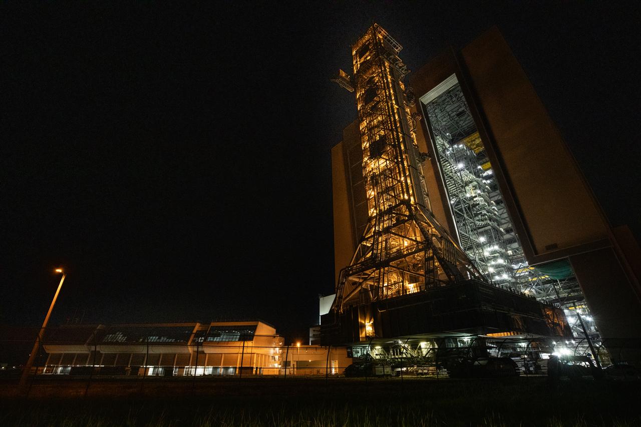 NASA’s mobile launcher 1 atop the spaceport’s crawler is transported inside the agency’s Vehicle Assembly Building at Kennedy Space Center in Florida ahead of integration of the Artemis II Moon rocket on Friday, Oct. 4, 2024. The mobile launcher has been at Launch Complex 39B since August 2023 undergoing upgrades and tests in preparation for NASA’s Artemis II mission. The mobile launcher will be used to assemble, process, and launch NASA’s SLS (Space Launch Systems) and Orion spacecraft to the Moon and beyond.