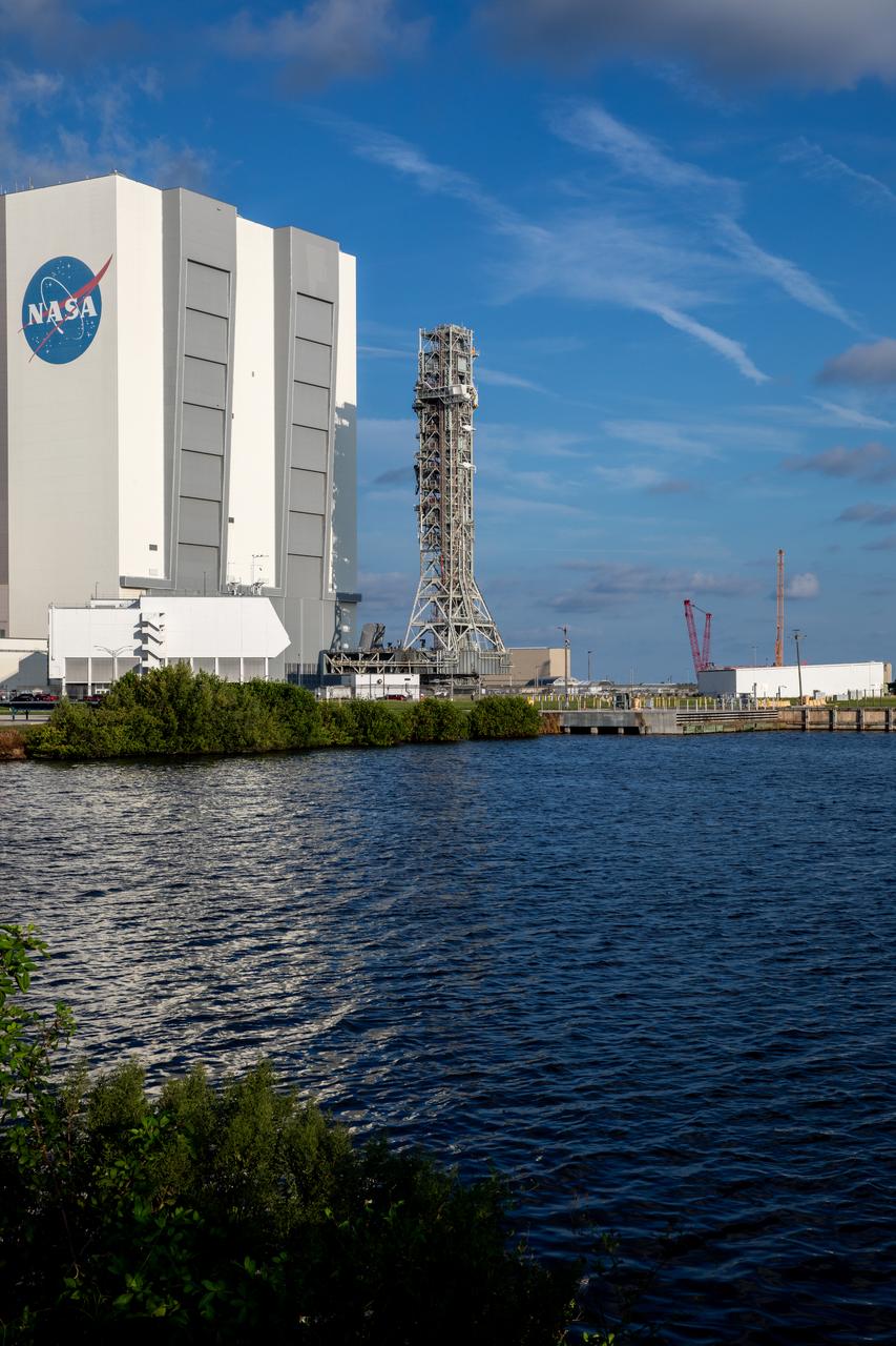 Teams with NASA’s Exploration Ground Systems Program transport the 380-foot-tall mobile launcher 1 along a 4.2-mile stretch to the iconic Vehicle Assembly Building at NASA’s Kennedy Space Center in Florida on Thursday, Oct. 3, 2024. The crawler transporter recently reached 2,500 miles traveling to the launch pad since its construction in 1965. The mobile launcher has been at Launch Complex 39B since August 2023 undergoing upgrades and tests in preparation for NASA’s Artemis II mission. The mobile launcher will be used to assemble, process, and launch NASA’s SLS (Space Launch Systems) and Orion spacecraft to the Moon and beyond.  