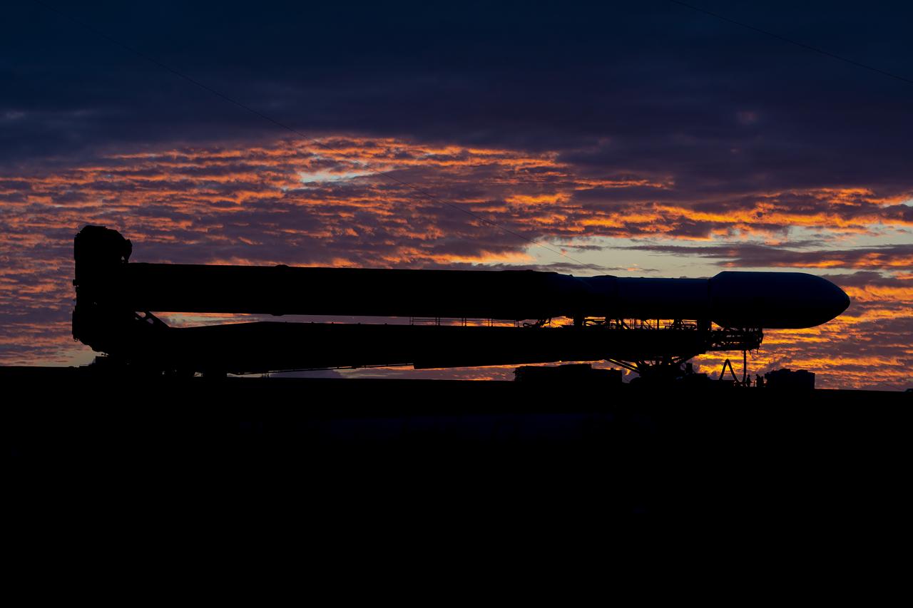 NASA’s Europa Clipper spacecraft attached to SpaceX’s Falcon Heavy rocket, rolls to Launch Pad 39A on Saturday, Oct. 12, 2024, at NASA’s Kennedy Space Center in Florida ahead of launch to Jupiter’s icy moon, Europa. The spacecraft will complete nearly 50 flybys of Europa to determine if there are conditions suitable for life beyond Earth. NASA and SpaceX are targeting launch for Europa Clipper at 12:06 p.m. EDT on Monday, Oct. 14, from Launch Complex 39A at Kennedy Space Center in Florida.