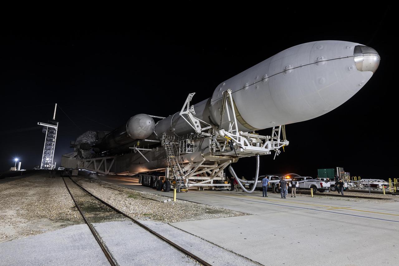 NASA’s Europa Clipper spacecraft attached to SpaceX’s Falcon Heavy rocket, rolls to Launch Pad 39A on Saturday, Oct. 12, 2024, at NASA’s Kennedy Space Center in Florida ahead of launch to Jupiter’s icy moon, Europa. The spacecraft will complete nearly 50 flybys of Europa to determine if there are conditions suitable for life beyond Earth. NASA and SpaceX are targeting launch for Europa Clipper at 12:06 p.m. EDT on Monday, Oct. 14, from Launch Complex 39A at Kennedy Space Center in Florida.