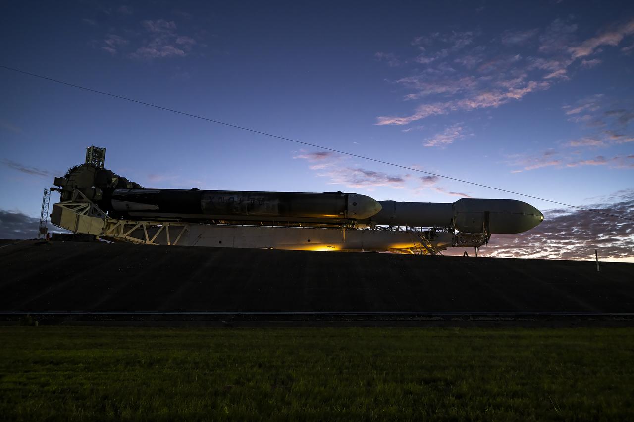 NASA’s Europa Clipper spacecraft attached to SpaceX’s Falcon Heavy rocket, rolls to Launch Pad 39A on Saturday, Oct. 12, 2024, at NASA’s Kennedy Space Center in Florida ahead of launch to Jupiter’s icy moon, Europa. The spacecraft will complete nearly 50 flybys of Europa to determine if there are conditions suitable for life beyond Earth. NASA and SpaceX are targeting launch for Europa Clipper at 12:06 p.m. EDT on Monday, Oct. 14, from Launch Complex 39A at Kennedy Space Center in Florida.