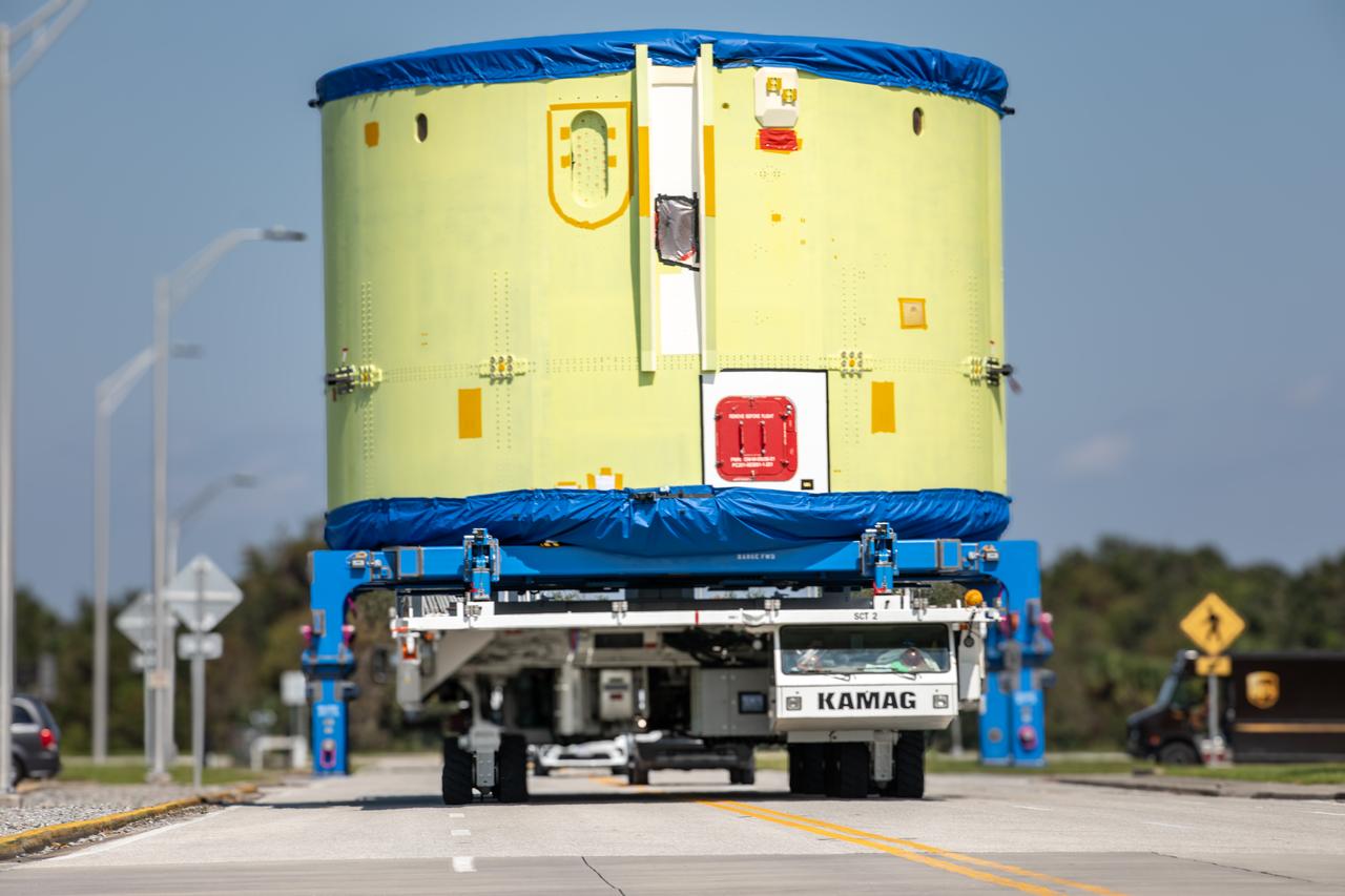 Teams from NASA’s Exploration Ground Systems transport the engine section of the agency’s Artemis IV SLS (Space Launch System) core stage from the Vehicle Assembly Building at NASA’s Kennedy Space Center in Florida to the spaceport’s Space Systems Processing Facility (SSPF) on Tuesday, Oct. 15, 2024. NASA’s Pegasus barge delivered the core stage engine section housing the four RS-25 engines from NASA’s Michoud Assembly Facility in New Orleans, Louisiana to NASA Kennedy on Thursday, Sept. 5, 2024. The engine section is one the most complex and intricate parts of the rocket stage that will help power the Artemis missions to the Moon. 