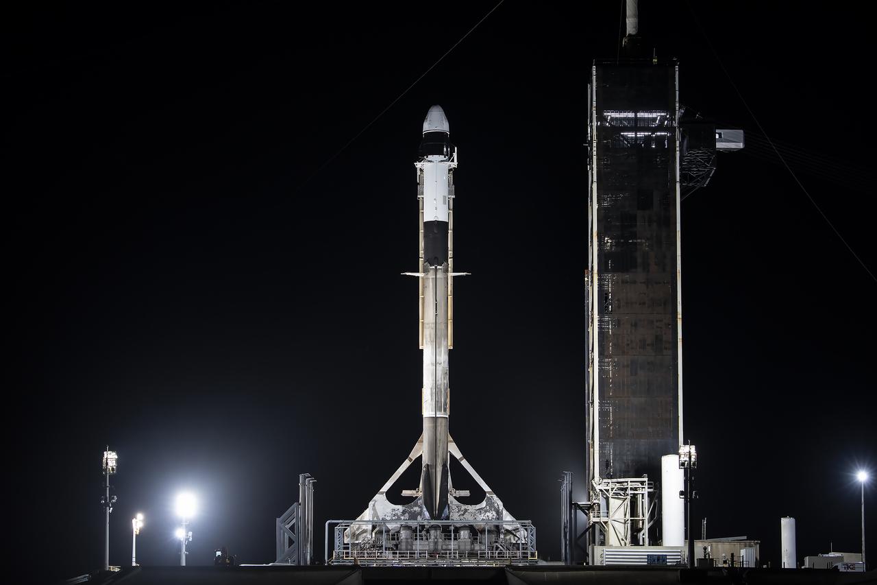 A SpaceX Falcon 9 rocket, with the company’s Dragon spacecraft atop, stands in a vertical position at Launch Complex 39A at NASA’s Kennedy Space Center in Florida on Monday, Nov. 4, 2024, in preparation for the 31st commercial resupply services launch to the International Space Station. Dragon will deliver several new experiments, including the Coronal Diagnostic Experiment, to examine solar wind and how it forms. Dragon also delivers Antarctic moss to observe the combined effects of cosmic radiation and microgravity on plants. Other investigations aboard include a device to test cold welding of metals in microgravity, and an investigation that studies how space impacts different materials. Liftoff is scheduled for 9:29 p.m. EST on Monday, Nov. 4.