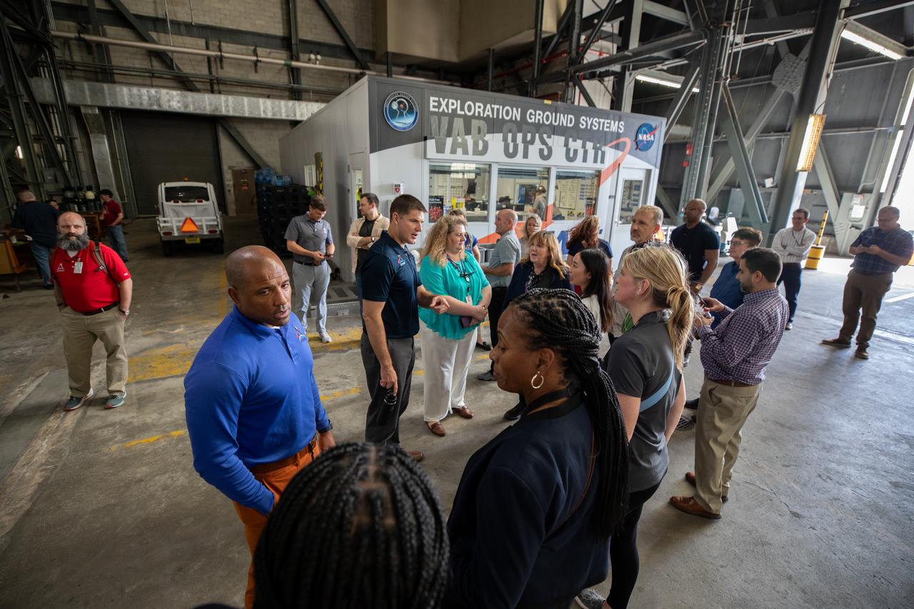 The Artemis II crew visits with employees from NASA’s Exploration Ground Systems Program on Tuesday, Nov. 19, 2024, inside the Vehicle Assembly Building at NASA's Kennedy Space Center in Florida.