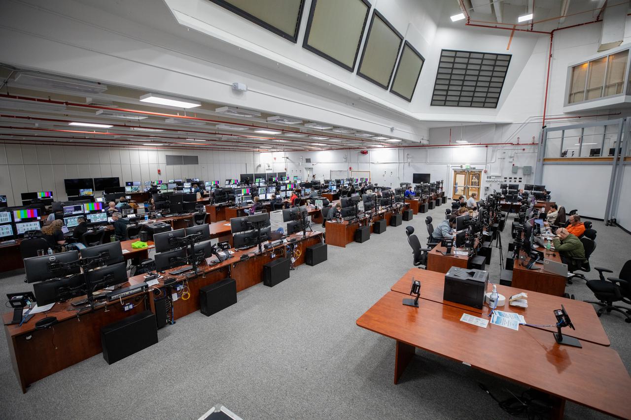 Members of the Artemis launch team participate in an Artemis II Terminal Count Simulation in Firing Room 1 inside the Launch Control Center at NASA’s Kennedy Space Center in Florida on Friday, Dec. 6, 2024. Teams practiced running through the last hours of launch countdown as part of an integrated ground systems test the Exploration Ground Systems team is undergoing to prepare for Artemis II. This particular operation focused on testing the updated launch control system software the Artemis launch team uses to launch the SLS (Space Launch System) rocket and Orion spacecraft. Four astronauts will venture around the Moon on Artemis II, the first crewed mission on NASA’s path to establishing a long-term presence for science and exploration through Artemis.