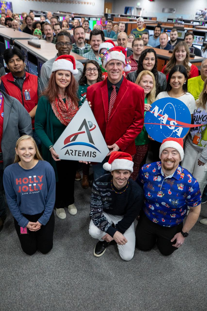 Charlie Blackwell-Thompson, center left, NASA Artemis launch director; and Jeremy Graeber, center right, assistant Artemis launch director, along with members of the Artemis launch team participate in a terminal countdown simulation for Artemis II in Firing Room 1 inside the Launch Control Center at NASA’s Kennedy Space Center in Florida on Thursday, Dec. 12, 2024. Four astronauts will venture around the Moon on Artemis II, the first crewed mission on NASA’s path to establishing a long-term presence for science and exploration through Artemis.