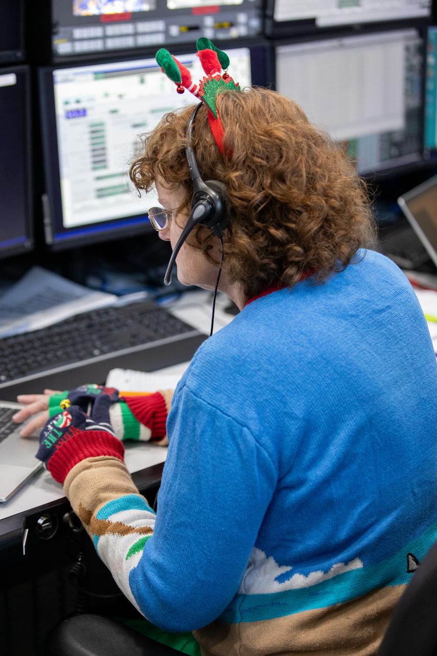 Members of the Artemis launch team participate in a terminal countdown simulation for Artemis II in Firing Room 1 inside the Launch Control Center at NASA’s Kennedy Space Center in Florida on Thursday, Dec. 12, 2024. Four astronauts will venture around the Moon on Artemis II, the first crewed mission on NASA’s path to establishing a long-term presence for science and exploration through Artemis.