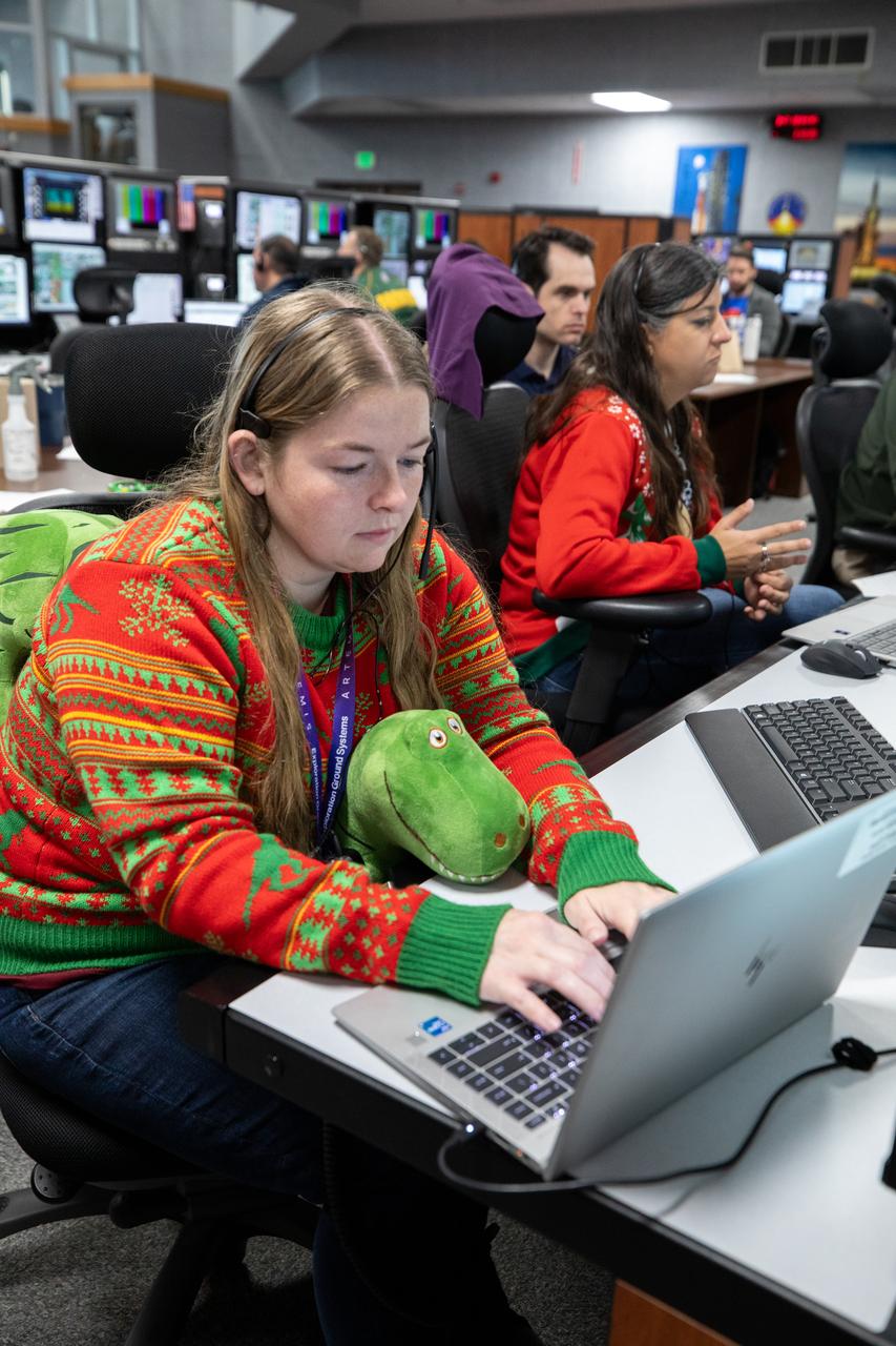 Members of the Artemis launch team participate in a terminal countdown simulation for Artemis II in Firing Room 1 inside the Launch Control Center at NASA’s Kennedy Space Center in Florida on Thursday, Dec. 12, 2024. Four astronauts will venture around the Moon on Artemis II, the first crewed mission on NASA’s path to establishing a long-term presence for science and exploration through Artemis.