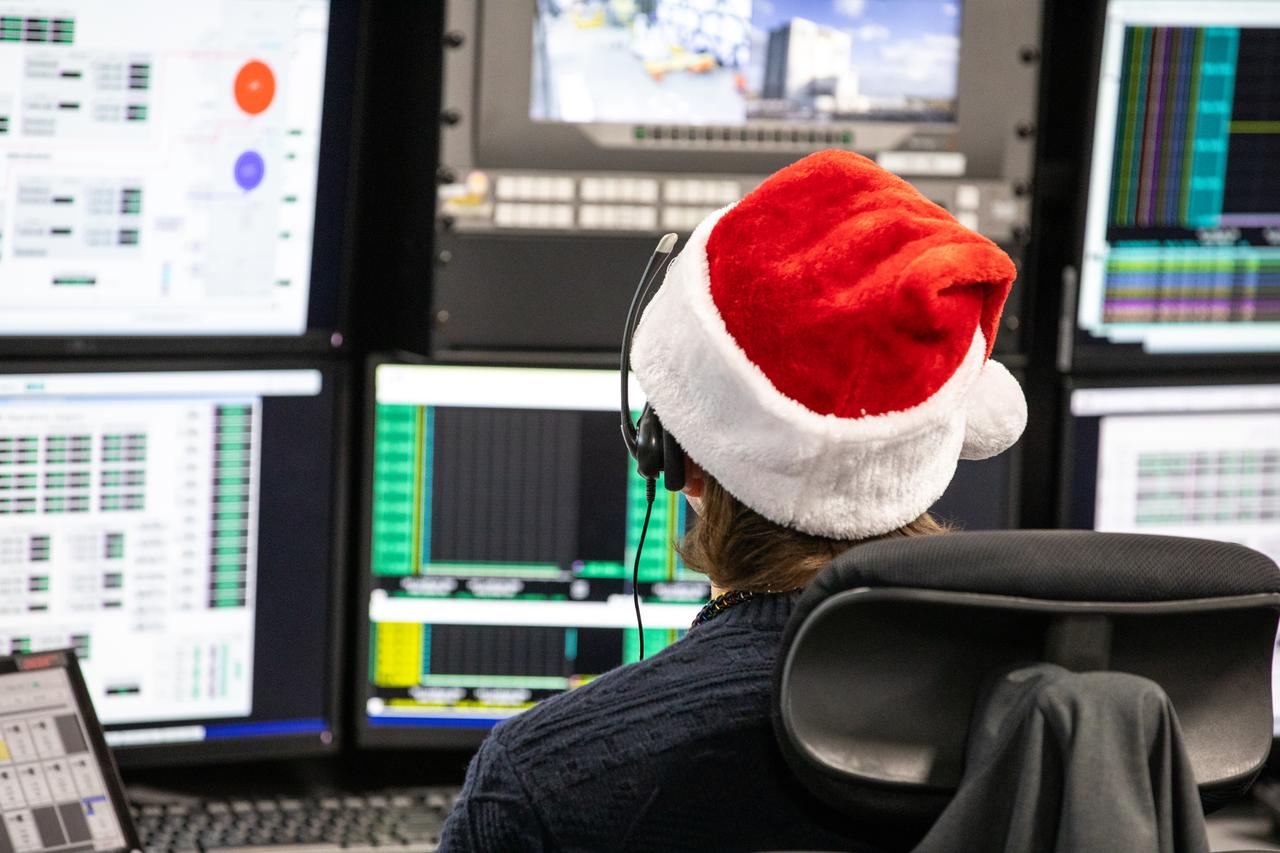 Members of the Artemis launch team participate in a terminal countdown simulation for Artemis II in Firing Room 1 inside the Launch Control Center at NASA’s Kennedy Space Center in Florida on Thursday, Dec. 12, 2024. Four astronauts will venture around the Moon on Artemis II, the first crewed mission on NASA’s path to establishing a long-term presence for science and exploration through Artemis.