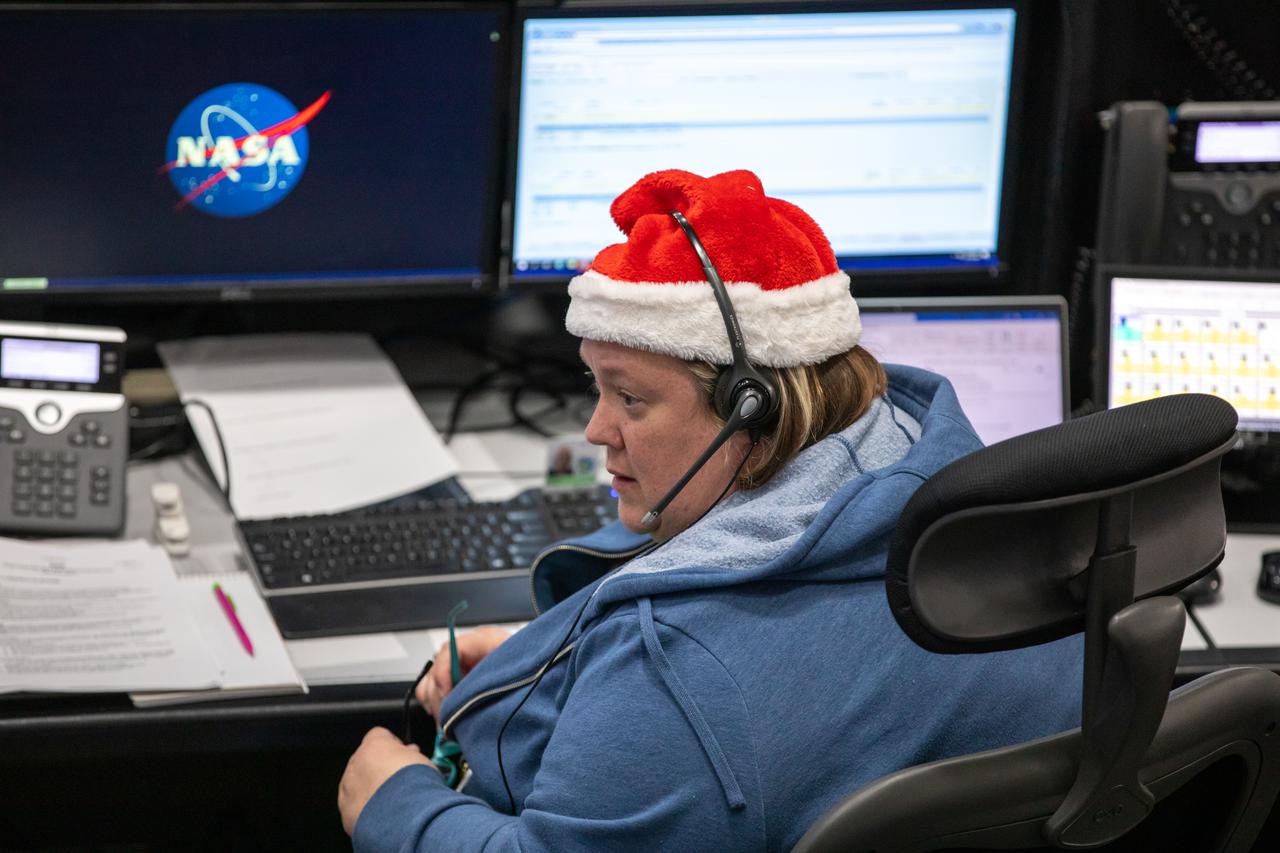 Members of the Artemis launch team participate in a terminal countdown simulation for Artemis II in Firing Room 1 inside the Launch Control Center at NASA’s Kennedy Space Center in Florida on Thursday, Dec. 12, 2024. Four astronauts will venture around the Moon on Artemis II, the first crewed mission on NASA’s path to establishing a long-term presence for science and exploration through Artemis.