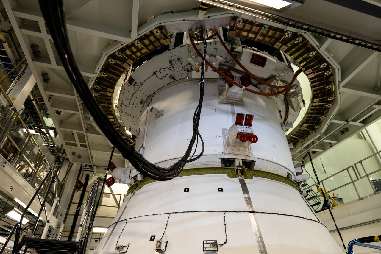 The Orion spacecraft for NASA’s Artemis II mission undergoes checkouts in the Final Assembly and System Testing (FAST) cell inside the high bay of the Neil A. Armstrong Operations and Checkout Building at NASA’s Kennedy Space Center in Florida on Monday, Dec. 15, 2024. The Orion spacecraft will carry NASA astronauts Victor Glover, Christina Koch, and Reid Wiseman, as well as CSA (Canadian Space Agency) astronaut Jeremy Hansen, on a 10-day journey around the Moon and back for the Artemis II test flight.