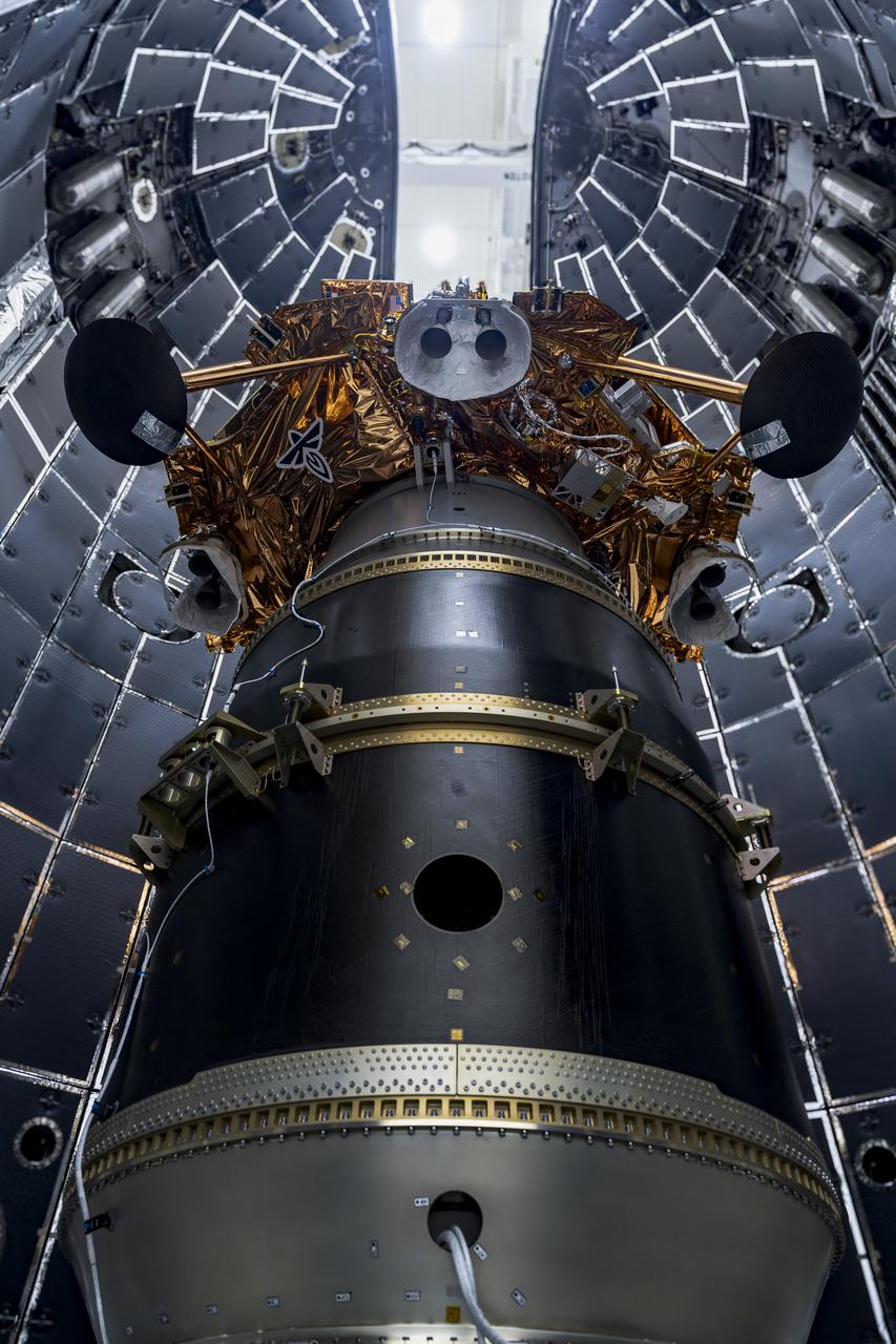 Firefly Aerospace’s Blue Ghost lunar lander is encapsulated inside SpaceX’s rocket fairing ahead of its targeted liftoff for 1:11 a.m. EST Wednesday, Jan. 15, 2025, from Launch Complex 39A at NASA’s Kennedy Space Center in Florida. Firefly’s Blue Ghost Mission 1 will be the company’s first flight to the Moon as part of the agency’s Commercial Lunar Payload Services or CLPS initiative and Artemis campaign. 