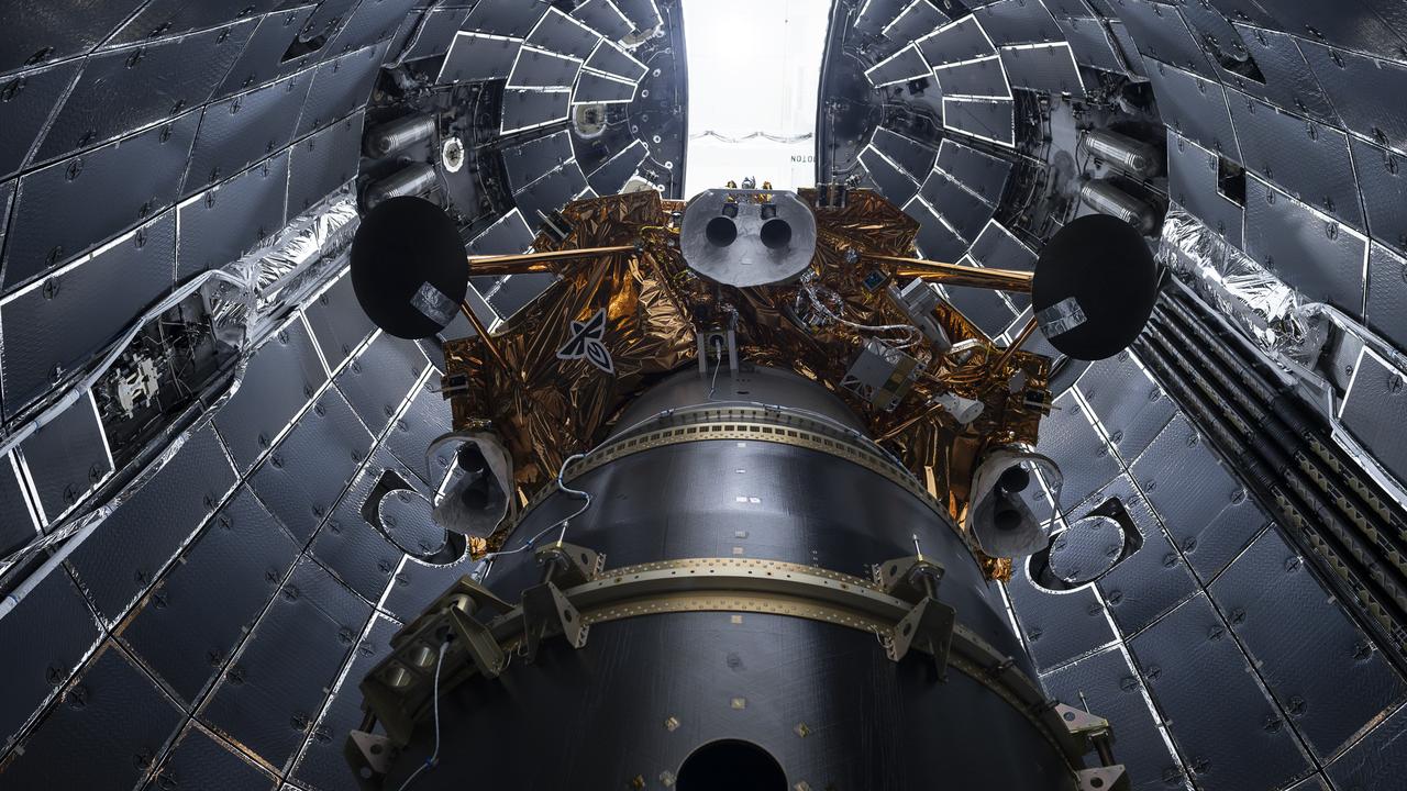 Firefly Aerospace’s Blue Ghost lunar lander is encapsulated inside SpaceX’s rocket fairing ahead of its targeted liftoff for 1:11 a.m. EST Wednesday, Jan. 15, 2025, from Launch Complex 39A at NASA’s Kennedy Space Center in Florida. Firefly’s Blue Ghost Mission 1 will be the company’s first flight to the Moon as part of the agency’s Commercial Lunar Payload Services or CLPS initiative and Artemis campaign. 