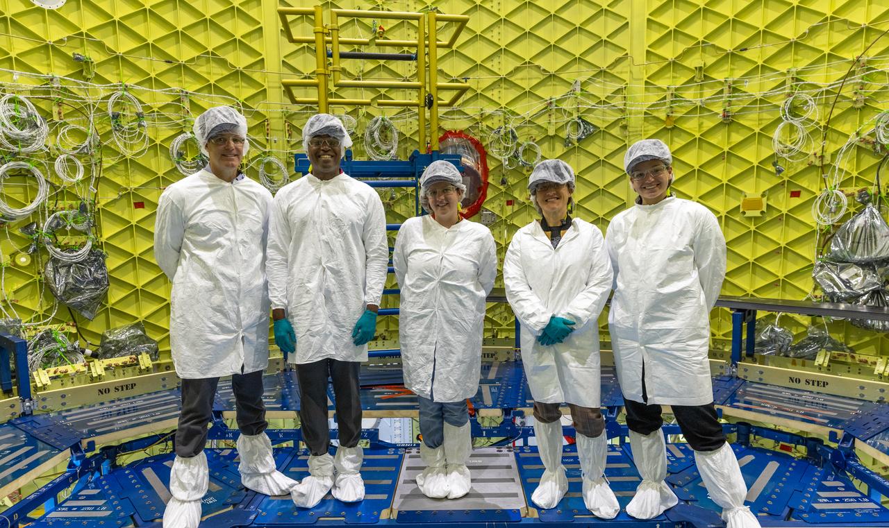 From left, CSA (Canadian Space Agency) astronaut Jeremy Hansen; Andre Douglas, NASA’s Artemis II backup crew member; a member of Exploration Ground Systems (EGS); Christina Koch, Artemis II mission specialist; and CSA astronaut Jenni Gibbons, Artemis II backup crew member, tour the Artemis III engine section inside the Space Systems Processing Facility at NASA’s Kennedy Space Center in Florida on Thursday, Jan. 16, 2025. Members and backup members of the Artemis II crew received updates on the mission and met with the EGS team. For Artemis II, four astronauts will venture around the Moon, the first crewed mission on NASA’s path to establishing a long-term presence for science and exploration through Artemis.