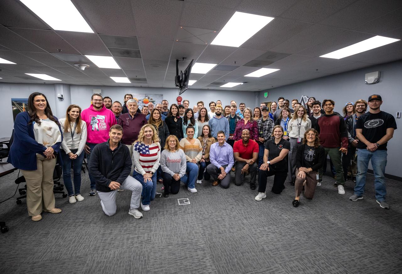 Members and backup members of the Artemis II team pose for a photo with NASA’s Exploration Ground Systems team during a visit to Kennedy Space Center in Florida on Thursday, Jan. 16, 2025. For Artemis II, four astronauts will venture around the Moon, the first crewed mission on NASA’s path to establishing a long-term presence for science and exploration through Artemis.