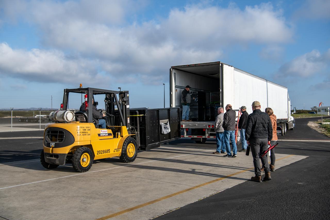 Teams at Vandenberg Space Force Base in California offload several shipping containers protecting NASA’s PUNCH (Polarimeter to Unify the Corona and Heliosphere) satellites on Saturday, Jan. 18, 2025. PUNCH will make 3D observations of the Sun’s corona to learn how the mass and energy becomes solar wind. PUNCH, along with NASA’s SPHEREx (Spectro-Photometer for the History of the Universe, Epoch of Reionization and Ices Explorer), a space telescope, will launch aboard a SpaceX Falcon 9 rocket in late February 2025.