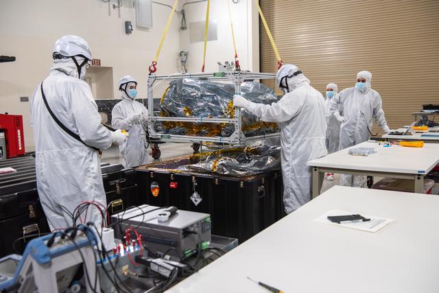 NASA image: PUNCH Satellites Lift to Work Stand fo Testing Operations