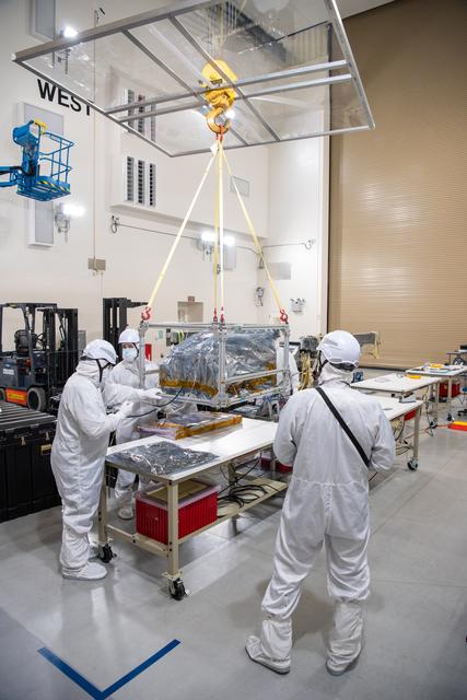NASA image: PUNCH Satellites Lift to Work Stand fo Testing Operations