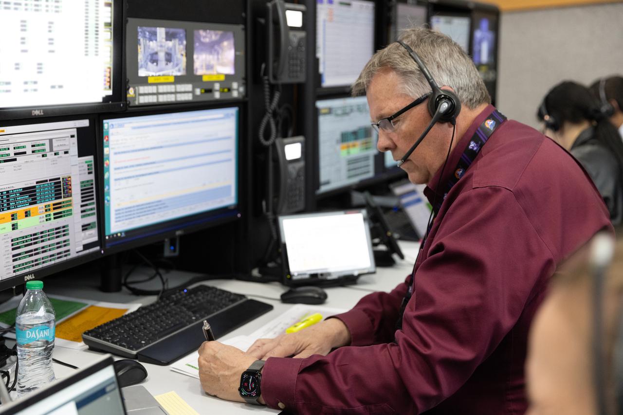 Members of the Artemis launch team participate in an Artemis II launch countdown simulation inside Firing Room 1 in the Launch Control Center at NASA’s Kennedy Space Center in Florida on Thursday, Jan. 23, 2025. The simulations go through launch day scenarios to help launch team members test software and make adjustments if needed during countdown operations. For Artemis II, four astronauts will venture around the Moon, the first crewed mission on NASA’s path to establishing a long-term presence for science and exploration through Artemis.