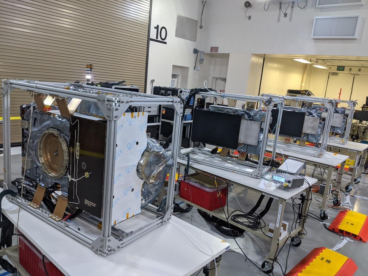 Technicians conduct integration and testing of NASA’s PUNCH (Polarimeter to Unify the Corona and Heliosphere) satellites during prelaunch operations inside Astrotech Space Operations on Vandenberg Space Force Base in California on Thursday, Jan. 23, 2025. PUNCH, consisting of four satellites, will produce continuous 3D images of the solar wind and solar storms as it travels from the Sun to Earth to better understand how material in the corona accelerates to become the solar wind that fills the solar system. PUNCH, along with NASA’s SPHEREx (Spectro-Photometer for the History of the Universe, Epoch of Reionization and Ices Explorer), a space telescope, will launch aboard a SpaceX Falcon 9 rocket in late February 2025.