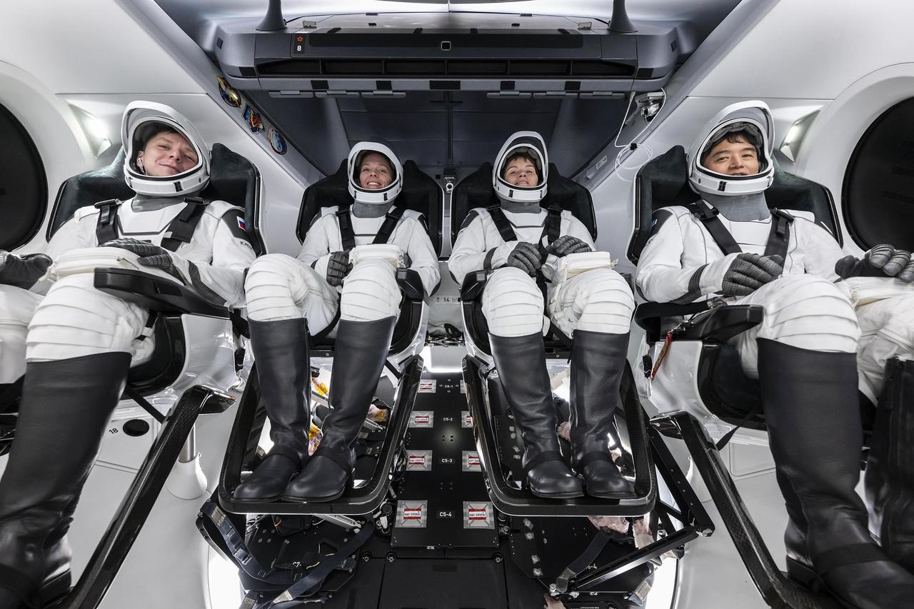 The crew of NASA’s SpaceX Crew-10 mission poses for a photo during a crew equipment interface test (CEIT) inside SpaceX’s new Dragon processing facility at the agency’s Kennedy Space Center in Florida on Monday, Feb. 17, 2025. From left, Roscosmos cosmonaut Kirill Peskov, mission specialist; NASA astronauts Nichole Ayers, pilot and Anne McClain, commander; and JAXA (Japan Aerospace Exploration Agency) astronaut Takuya Onishi, mission specialist, participated in the CEIT, which plays an important role in familiarizing crew members with the interior of the Dragon spacecraft ahead of their four-month mission to International Space Station. 