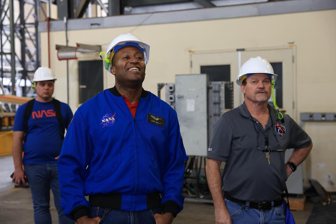 NASA astronaut Andre Douglas, Artemis II backup crew member, tours Artemis II operations with Artemis team members inside the Vehicle Assembly Building at NASA Kennedy on Thursday, Feb. 27, 2025. For Artemis II, four astronauts will venture around the Moon, the first crewed mission on NASA’s path to establishing a long-term presence for science and exploration through Artemis.