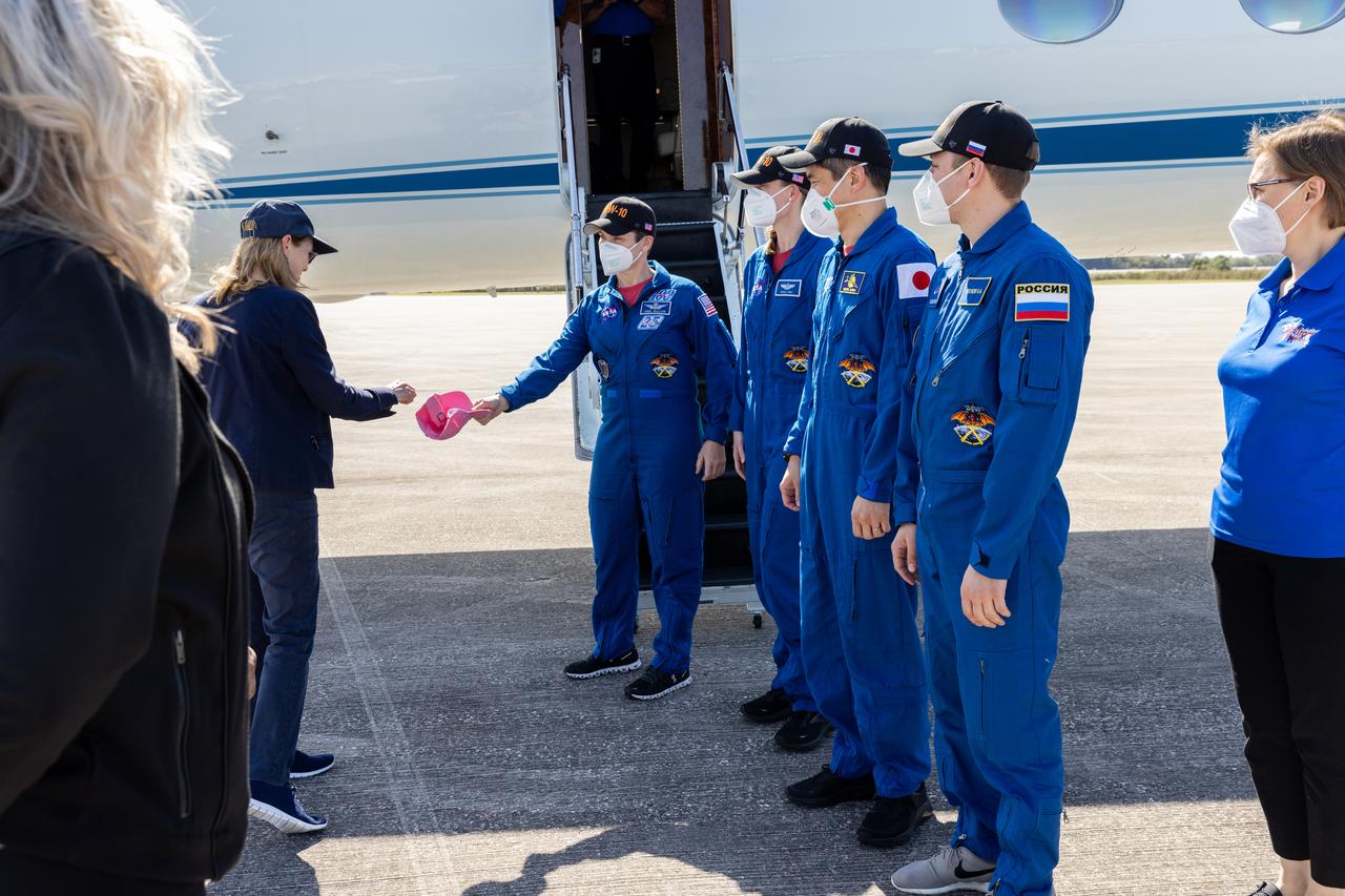 Acting NASA Administrator Janet Petro greets crew members of NASA’s SpaceX Crew-10 mission to the International Space Station after arrival to the Launch and Landing Facility at Kennedy Space Center in Florida on Friday, March 7, 2025. From left to right are Petro, NASA astronauts Anne McClain and Nichole Ayers, JAXA (Japan Aerospace Exploration Agency) astronaut Takuya Onishi, and Roscosmos cosmonaut Kirill Peskov. The Crew-10 mission is slated to launch aboard SpaceX’s Dragon spacecraft, powered by the company’s Falcon 9 rocket from NASA Kennedy’s Launch Complex 39A no earlier than 7:48 p.m. EDT on Wednesday, March 12, 2025.