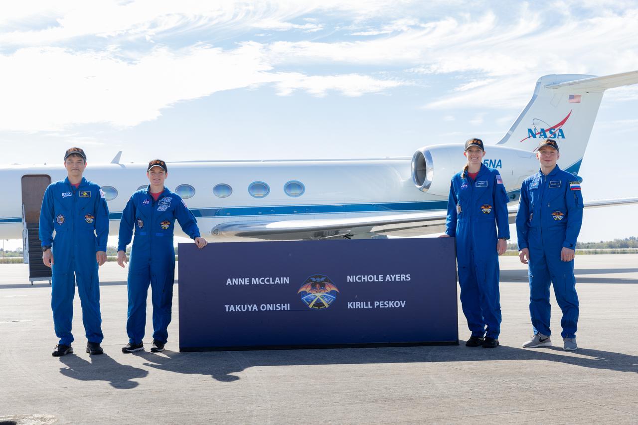 Crew members of NASA’s SpaceX Crew-10 mission to the International Space Station from left to right JAXA (Japan Aerospace Exploration Agency) astronaut Takuya Onishi, NASA astronaut Anne McClain, NASA astronaut Nichole Ayers, and Roscosmos cosmonaut Kirill Peskov stand before members of the news media after arrival to the Launch and Landing Facility at Kennedy Space Center in Florida on Friday, March 7, 2025. The Crew-10 mission is slated to launch aboard SpaceX’s Dragon spacecraft, powered by the company’s Falcon 9 rocket from NASA Kennedy’s Launch Complex 39A no earlier than 7:48 p.m. EDT on Wednesday, March 12, 2025.