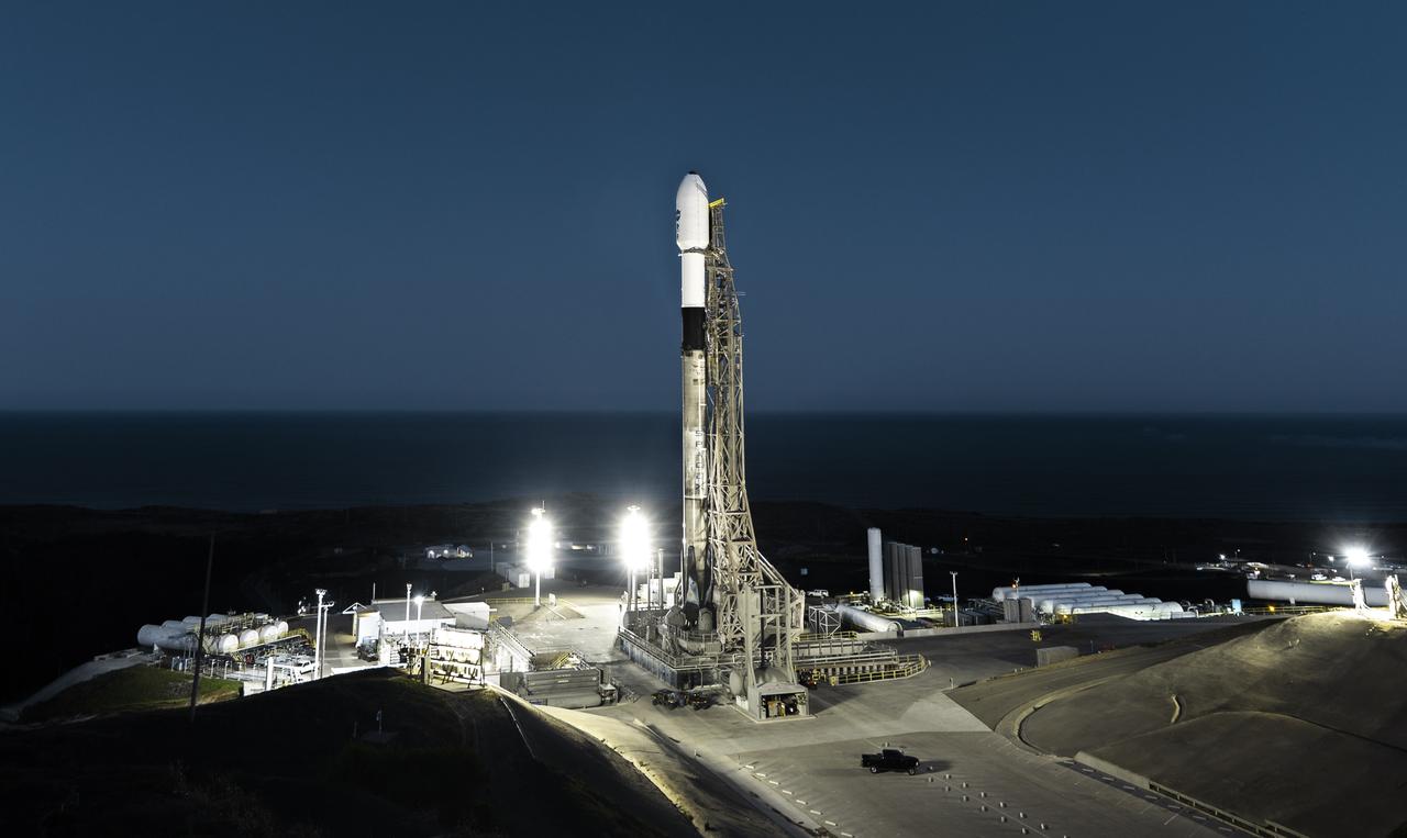 A SpaceX Falcon 9 rocket, carrying NASA’s SPHEREx (Spectro-Photometer for the History of the Universe, Epoch of Reionization and Ices Explorer) observatory and PUNCH (Polarimeter to Unify the Corona and Heliosphere) satellites, is vertical at Space Launch Complex 4 East from Vandenberg Space Force Base in California on Saturday March 8, 2025. SPHEREx will use its telescope to provide an all-sky spectral survey, creating a 3D map of the entire sky to help scientists investigate the origins of our universe. PUNCH will study origins of the Sun’s outflow of material, or the solar wind, capturing continuous 3D images of the Sun’s corona and the solar wind’s journey into the solar system. 