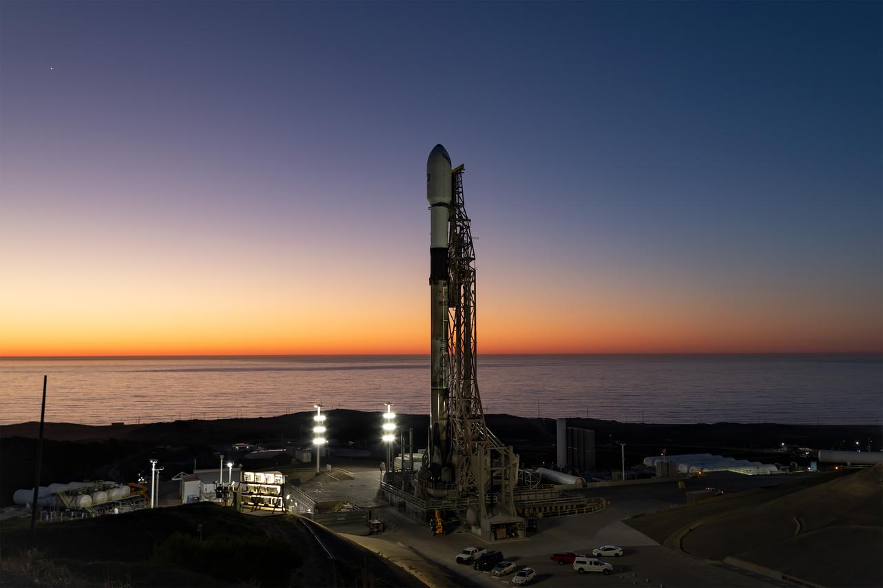 A SpaceX Falcon 9 rocket, carrying NASA’s SPHEREx (Spectro-Photometer for the History of the Universe, Epoch of Reionization and Ices Explorer) observatory and PUNCH (Polarimeter to Unify the Corona and Heliosphere) satellites, is vertical at Space Launch Complex 4 East from Vandenberg Space Force Base in California on Saturday, March 8, 2025. SPHEREx will use its telescope to provide an all-sky spectral survey, creating a 3D map of the entire sky to help scientists investigate the origins of our universe. PUNCH will study origins of the Sun’s outflow of material, or the solar wind, capturing continuous 3D images of the Sun’s corona and the solar wind’s journey into the solar system. 