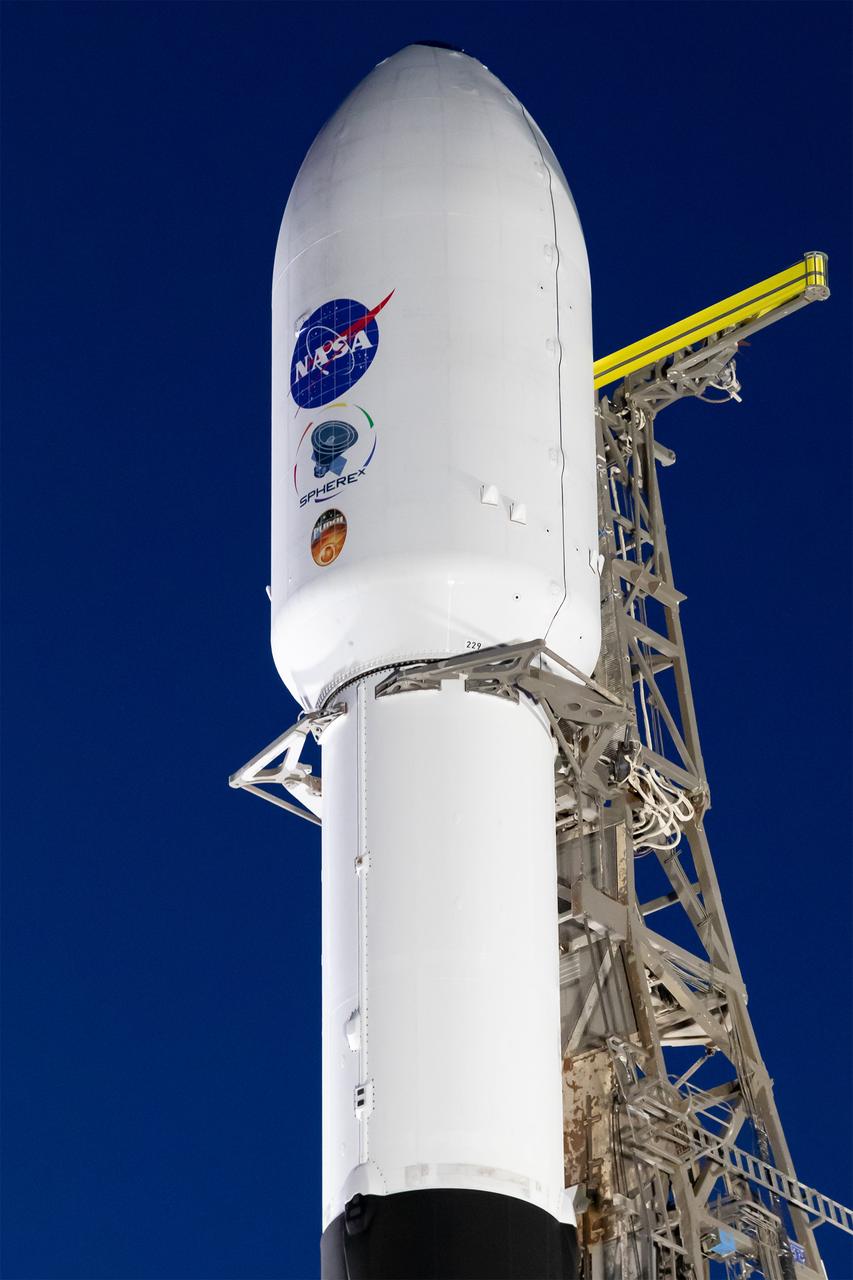 A SpaceX Falcon 9 rocket, carrying NASA’s SPHEREx (Spectro-Photometer for the History of the Universe, Epoch of Reionization and Ices Explorer) observatory and PUNCH (Polarimeter to Unify the Corona and Heliosphere) satellites, is vertical at Space Launch Complex 4 East from Vandenberg Space Force Base in California on Saturday, March 8, 2025. SPHEREx will use its telescope to provide an all-sky spectral survey, creating a 3D map of the entire sky to help scientists investigate the origins of our universe. PUNCH will study origins of the Sun’s outflow of material, or the solar wind, capturing continuous 3D images of the Sun’s corona and the solar wind’s journey into the solar system. 