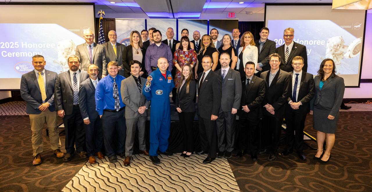 NASA astronaut Randy Bresnik poses with Space Flight Awareness Honoree Award recipients during the agency’s 2025 Space Flight Awareness Awards ceremony on Monday, March 10, 2025, in Cocoa Beach, Florida. The Space Flight Awareness Program, managed by NASA’s Space Operations Mission Directorate, recognizes NASA employees and contractors for significant contributions to mission success and flight safety in the human spaceflight program.