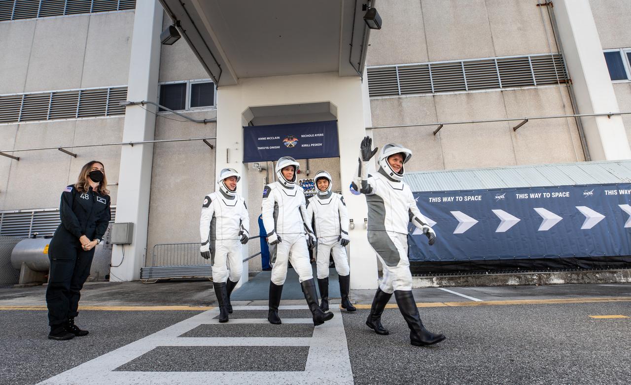 NASA’s SpaceX Crew-10 crew members walk out of the Neil A. Armstrong Operations and Checkout Building at the agency’s Kennedy Space Center in Florida ahead of launch on Wednesday, March 12, 2025. From left to right, Roscosmos cosmonaut Kirill Peskov, NASA astronaut Nichole Ayers, JAXA (Japan Aerospace Exploration Agency) astronaut Takuya Onishi, and NASA astronaut Anne McClain are scheduled to lift off aboard SpaceX’s Dragon spacecraft and Falcon 9 rocket at 7:48 p.m. EDT, from Launch Complex 39A at NASA Kennedy. Crew-10 is the tenth crew rotation mission with SpaceX to the space station as part of the agency’s Commercial Crew Program.