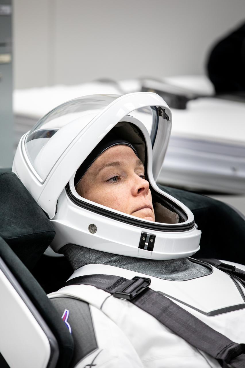 NASA astronaut Nichole Ayers is photographed in her SpaceX spacesuit inside the crew suit-up room in the Neil A. Armstrong Operations and Checkout Building at the agency’s Kennedy Space Center in Florida ahead of launch of NASA’s SpaceX Crew-10 mission on Wednesday, March 12, 2025. Ayers and fellow NASA astronaut Anne McClain, along with JAXA (Japan Aerospace Exploration Agency) astronaut Takuya Onishi and Roscosmos cosmonaut Kirill Peskov are scheduled to lift off aboard SpaceX’s Dragon spacecraft and Falcon 9 rocket at 7:48 p.m. EDT, from Launch Complex 39A at NASA Kennedy. Crew-10 is the 10th crew rotation mission with SpaceX to the space station as part of the agency’s Commercial Crew Program.