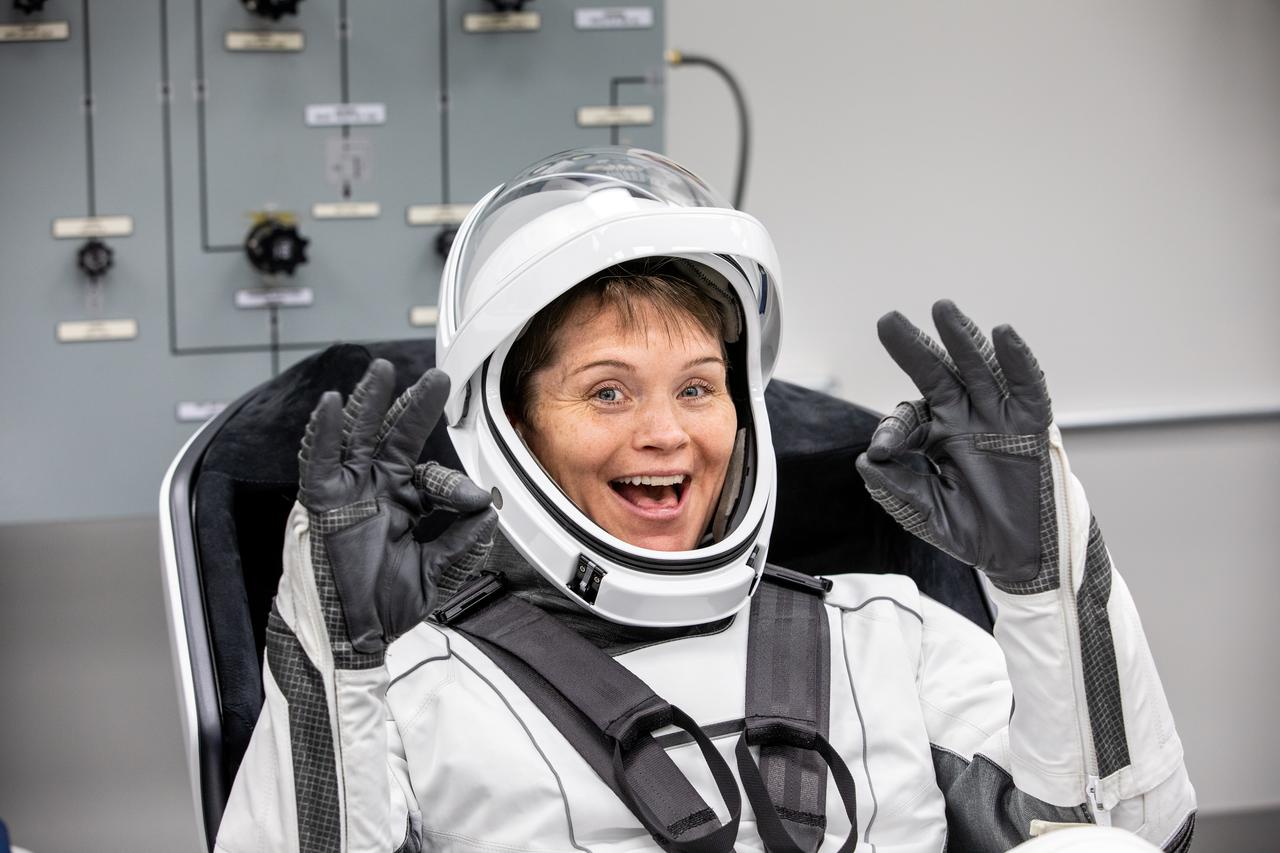 NASA astronaut Anne McClain is photographed in her SpaceX spacesuit inside the crew suit-up room in the Neil A. Armstrong Operations and Checkout Building at the agency’s Kennedy Space Center in Florida ahead of launch of NASA’s SpaceX Crew-10 mission on Wednesday, March 12, 2025. McClain and fellow NASA astronaut Nichole Ayers, along with JAXA (Japan Aerospace Exploration Agency) astronaut Takuya Onishi and Roscosmos cosmonaut Kirill Peskov are scheduled to lift off aboard SpaceX’s Dragon spacecraft and Falcon 9 rocket at 7:48 p.m. EDT, from Launch Complex 39A at NASA Kennedy. Crew-10 is the 10th crew rotation mission with SpaceX to the space station as part of the agency’s Commercial Crew Program.
