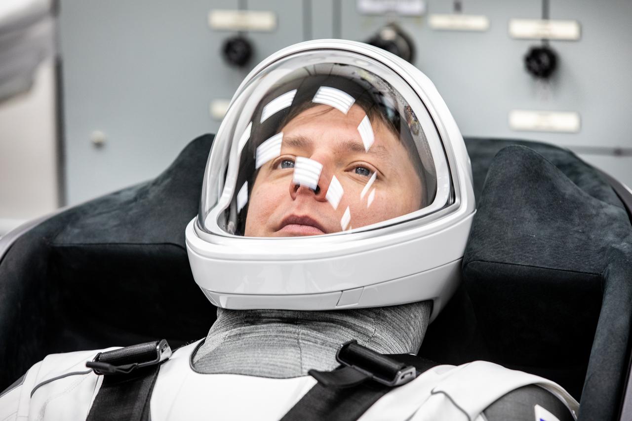 Roscosmos cosmonaut Kirill Peskov is photographed in his SpaceX spacesuit inside the crew suit-up room in the Neil A. Armstrong Operations and Checkout Building at the agency’s Kennedy Space Center in Florida ahead of launch of NASA’s SpaceX Crew-10 mission on Wednesday, March 12, 2025. NASA astronauts Anne McClain and Nichole Ayers, along with JAXA (Japan Aerospace Exploration Agency) astronaut Takuya Onishi and Peskov are scheduled to lift off aboard SpaceX’s Dragon spacecraft and Falcon 9 rocket at 7:48 p.m. EDT, from Launch Complex 39A at NASA Kennedy. Crew-10 is the 10th crew rotation mission with SpaceX to the space station as part of the agency’s Commercial Crew Program.