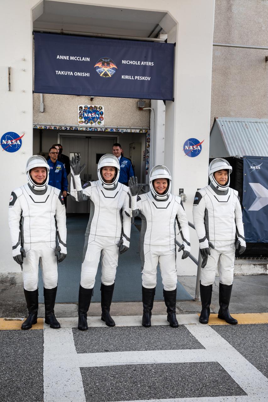 NASA’s SpaceX Crew-10 crew members pose for a photo after walking out of the Neil A. Armstrong Operations and Checkout Building at the agency’s Kennedy Space Center in Florida ahead of launch of the Crew-10 mission on Friday, March 14, 2025. From left to right, Roscosmos cosmonaut Kirill Peskov, NASA astronauts Anne McClain and Nichole Ayers, along with JAXA (Japan Aerospace Exploration Agency) astronaut Takuya Onishi are scheduled to lift off aboard SpaceX’s Dragon spacecraft and Falcon 9 rocket at 7:03 p.m. EDT, from Launch Complex 39A at NASA Kennedy. Crew-10 is the 10th crew rotation mission with SpaceX to the space station as part of the agency’s Commercial Crew Program.