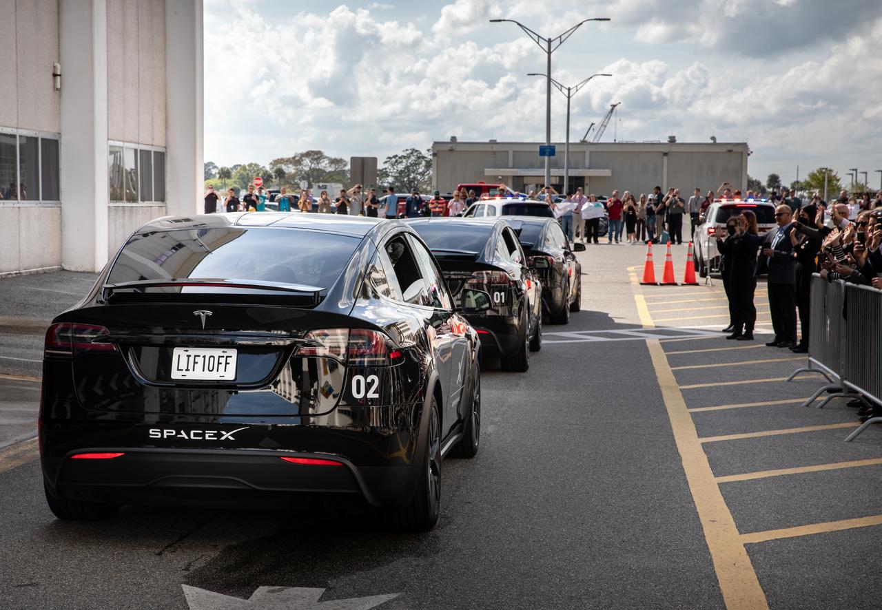 The convoy carrying NASA’s SpaceX Crew-10 makes the journey from the Neil A. Armstrong Operations and Checkout Building at the agency’s Kennedy Space Center in Florida to nearby Launch Complex 39A ahead of launch on Friday, March 14, 2025. NASA astronauts Anne McClain and Nichole Ayers, along with JAXA (Japan Aerospace Exploration Agency) astronaut Takuya Onishi and Roscosmos cosmonaut Kirill Peskov are scheduled to lift off aboard SpaceX’s Dragon spacecraft and Falcon 9 rocket at 7:03 p.m. EDT. Crew-10 is the 10th crew rotation mission with SpaceX to the space station as part of the agency’s Commercial Crew Program.
