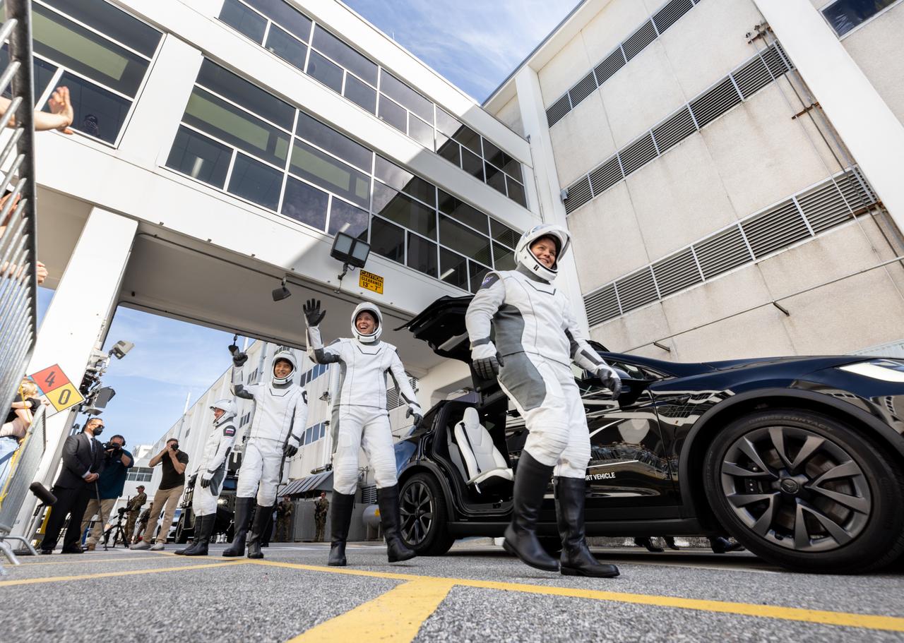 NASA’s SpaceX Crew-10 crew members pose for a photo after walking out of the Neil A. Armstrong Operations and Checkout Building at the agency’s Kennedy Space Center in Florida ahead of launch of the Crew-10 mission on Friday, March 14, 2025. From left to right, Roscosmos cosmonaut Kirill Peskov, NASA astronauts Anne McClain and Nichole Ayers, along with JAXA (Japan Aerospace Exploration Agency) astronaut Takuya Onishi are scheduled to lift off aboard SpaceX’s Dragon spacecraft and Falcon 9 rocket at 7:03 p.m. EDT, from Launch Complex 39A at NASA Kennedy. Crew-10 is the 10th crew rotation mission with SpaceX to the space station as part of the agency’s Commercial Crew Program