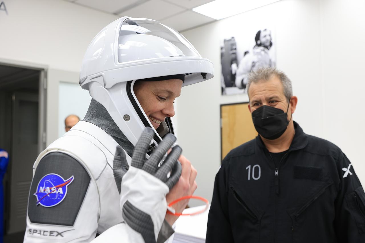 NASA astronaut Nichole Ayers is photographed in her SpaceX spacesuit inside the crew suit-up room in the Neil A. Armstrong Operations and Checkout Building at the agency’s Kennedy Space Center in Florida ahead of launch of NASA’s SpaceX Crew-10 mission on Friday, March 14, 2025. Ayers and fellow NASA astronaut Anne McClain, along with JAXA (Japan Aerospace Exploration Agency) astronaut Takuya Onishi and Roscosmos cosmonaut Kirill Peskov are scheduled to lift off aboard SpaceX’s Dragon spacecraft and Falcon 9 rocket at 7:03 p.m. EDT, from Launch Complex 39A at NASA Kennedy. Crew-10 is the 10th crew rotation mission with SpaceX to the space station as part of the agency’s Commercial Crew Program.