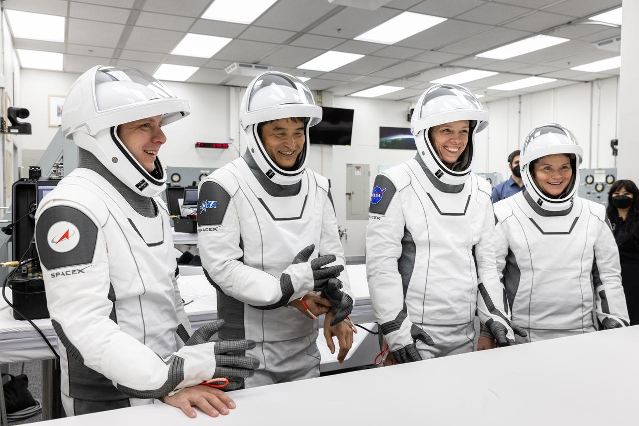 NASA’s SpaceX Crew-10 crew members play the traditional card game with NASA astronaut chief Joe Acaba, inside the Neil A. Armstrong Operations and Checkout Building at the agency’s Kennedy Space Center in Florida ahead of launch to the International Space Station on Friday, March 14, 2025. From left to right, Roscosmos cosmonaut Kirill Peskov, JAXA (Japan Aerospace Exploration Agency) astronaut Takuya Onishi, as well as NASA astronauts Nichole Ayers and Anne McClain are scheduled to lift off aboard SpaceX’s Dragon spacecraft and Falcon 9 rocket at 7:03 p.m. EDT, from Launch Complex 39A at NASA Kennedy. Crew-10 is the 10th crew rotation mission with SpaceX to the space station as part of the agency’s Commercial Crew Program.