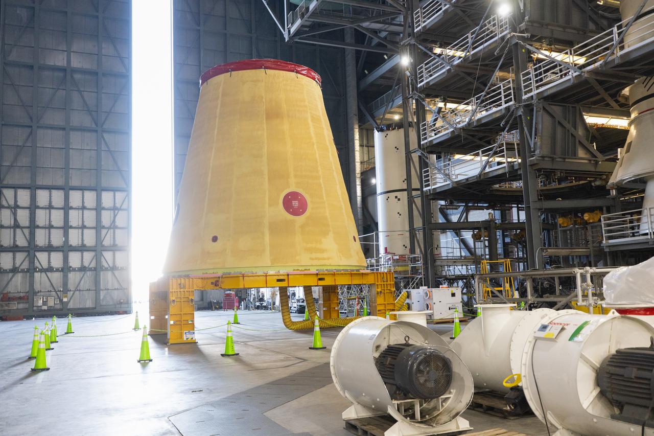 NASA’s Artemis II hardware, the launch vehicle stage adapter, is inside High Bay 4 on Thursday, March 20, 2025, at the Vehicle Assembly Building at NASA’s Kennedy Space Center in Florida ahead of rocket stacking operations. The cone shaped launch vehicle stage adapter connects the SLS (Space Launch System) Moon rocket to the upper stage, the interim cryogenic propulsion stage, and protects the rocket’s flight computers, avionics, and electrical devices during launch and ascent during the Artemis missions.