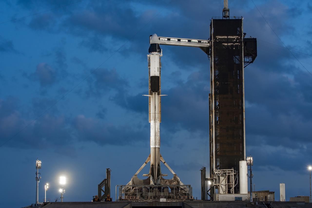 A SpaceX Falcon 9 rocket, with the company’s Dragon spacecraft atop, stands in a vertical position at Launch Complex 39A at NASA’s Kennedy Space Center in Florida on Monday, April 21, in preparation for the 32nd commercial resupply services launch to the International Space Station. Dragon is delivering a variety of science experiments, including a demonstration of refined maneuvers for free-floating robots. Dragon also carries an enhanced air quality monitoring system that could protect crew members on exploration missions to the Moon and Mars, and two atomic clocks to examine fundamental physics concepts such as relativity and test worldwide synchronization of precision timepieces.