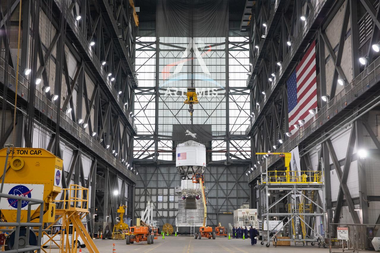 Teams with NASA’s Exploration Ground Systems Program begin integrating the interim cryogenic propulsion stage to the SLS (Space Launch System) launch vehicle stage adapter on Wednesday, April 30, 2025, inside the Vehicle Assembly Building at NASA’s Kennedy Space Center in Florida. The four-story propulsion system, built by Boeing and ULA (United Launch Alliance), is powered by an RL10 engine that will enable the Orion spacecraft to build up enough speed for the push toward the Moon during the Artemis II crewed test flight.