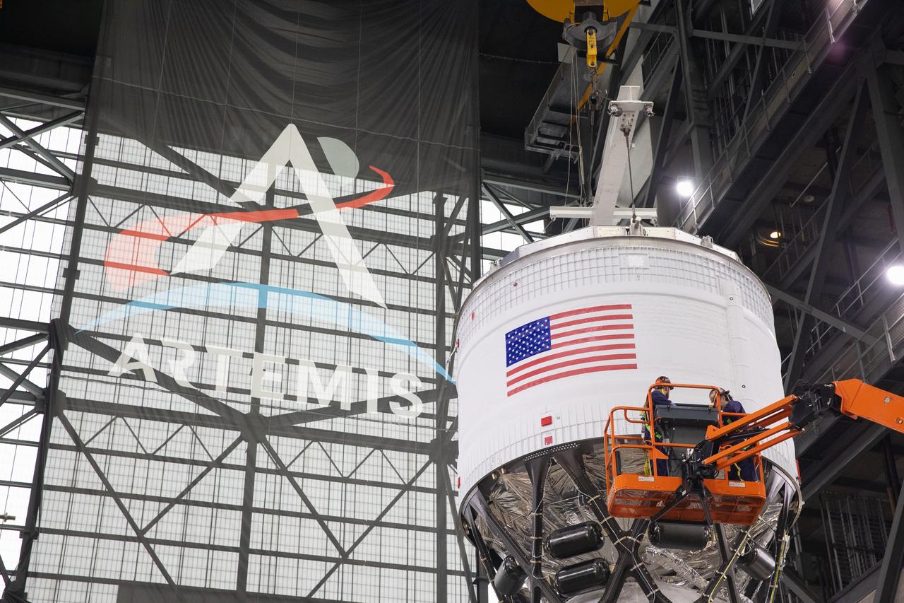 Teams with NASA’s Exploration Ground Systems Program begin integrating the interim cryogenic propulsion stage to the SLS (Space Launch System) launch vehicle stage adapter on Wednesday, April 30, 2025, inside the Vehicle Assembly Building at NASA’s Kennedy Space Center in Florida. The four-story propulsion system, built by Boeing and ULA (United Launch Alliance), is powered by an RL10 engine that will enable the Orion spacecraft to build up enough speed for the push toward the Moon during the Artemis II crewed test flight.