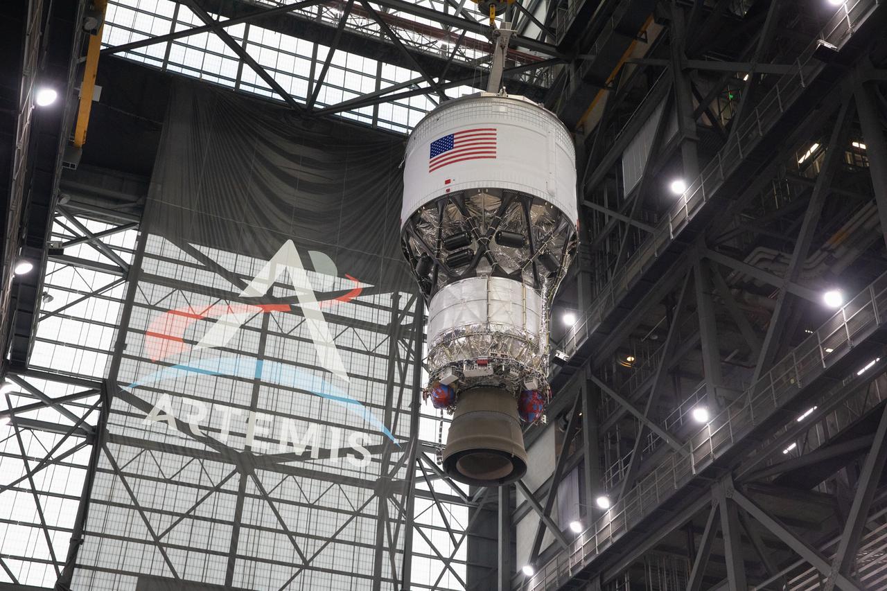 Teams with NASA’s Exploration Ground Systems Program begin integrating the interim cryogenic propulsion stage to the SLS (Space Launch System) launch vehicle stage adapter on Wednesday, April 30, 2025, inside the Vehicle Assembly Building at NASA’s Kennedy Space Center in Florida. The four-story propulsion system, built by Boeing and ULA (United Launch Alliance), is powered by an RL10 engine that will enable the Orion spacecraft to build up enough speed for the push toward the Moon during the Artemis II crewed test flight.