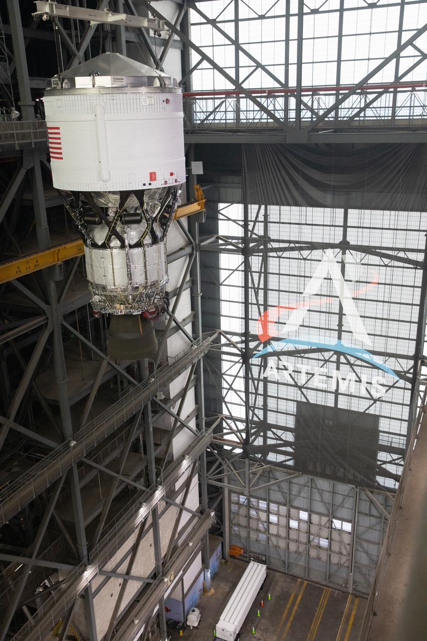Teams with NASA’s Exploration Ground Systems Program begin integrating the interim cryogenic propulsion stage to the SLS (Space Launch System) launch vehicle stage adapter on Wednesday, April 30, 2025, inside the Vehicle Assembly Building at NASA’s Kennedy Space Center in Florida. The four-story propulsion system, built by Boeing and ULA (United Launch Alliance), is powered by an RL10 engine that will enable the Orion spacecraft to build up enough speed for the push toward the Moon during the Artemis II crewed test flight.