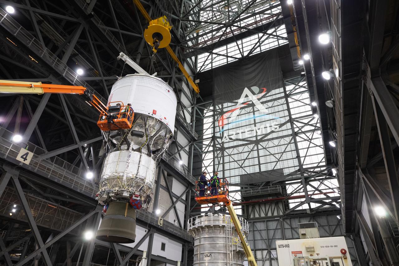 Teams with NASA’s Exploration Ground Systems Program begin integrating the interim cryogenic propulsion stage to the SLS (Space Launch System) launch vehicle stage adapter on Wednesday, April 30, 2025, inside the Vehicle Assembly Building at NASA’s Kennedy Space Center in Florida. The four-story propulsion system, built by Boeing and ULA (United Launch Alliance), is powered by an RL10 engine that will enable the Orion spacecraft to build up enough speed for the push toward the Moon during the Artemis II crewed test flight.